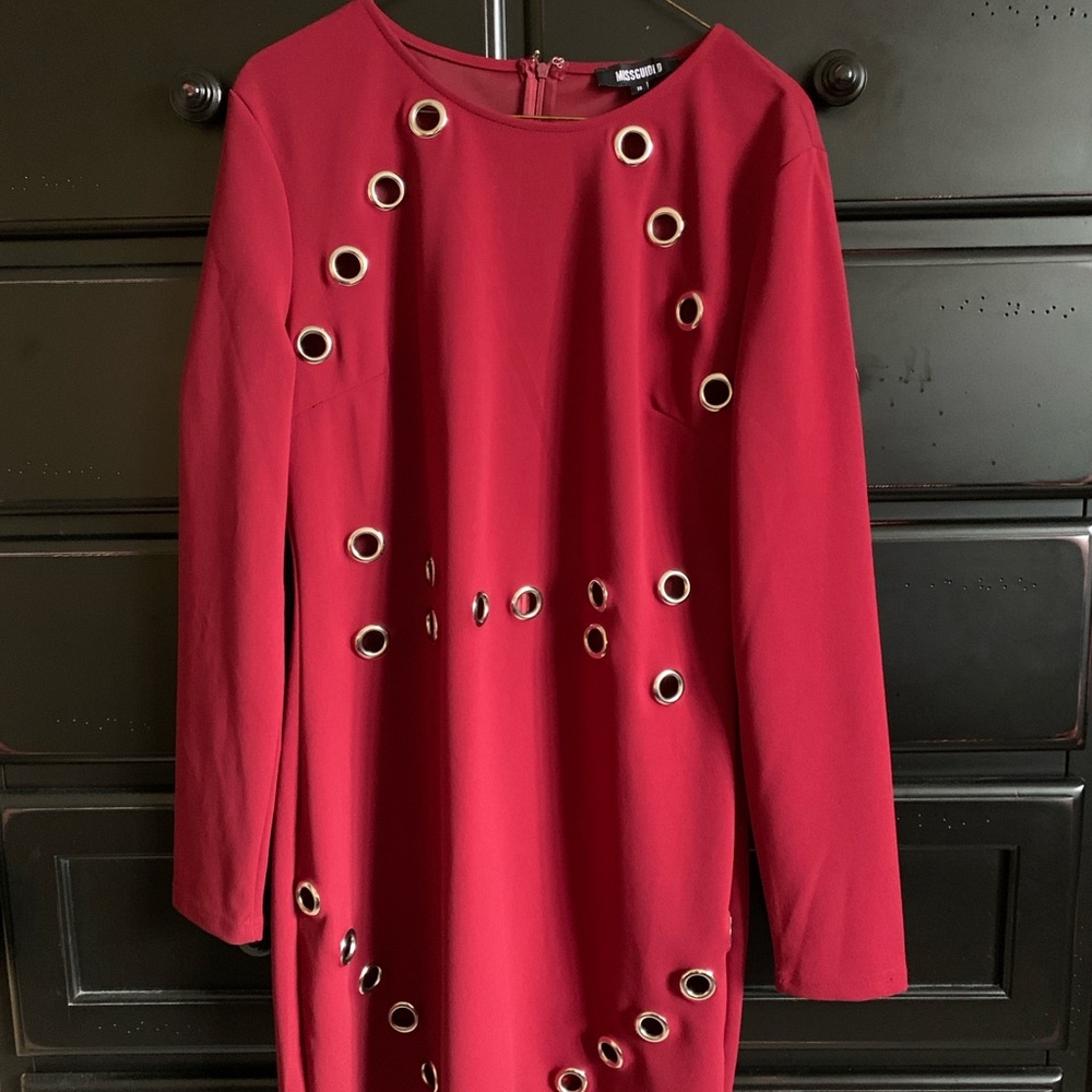 Misguided red dress with purposefully placed holes, size 16, dryclean